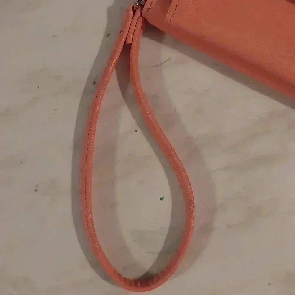 NWOT TAHARI PINK WRISTLET WALLET WITH IDENTITY PROOF LINING